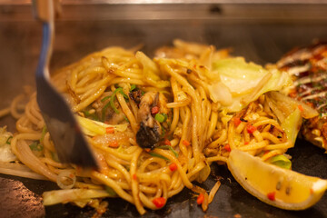Yakisoba, a popular Japanese noodle dish, teppanyaki, ready to eat