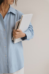 Professional, work, business concept. Person holding office documents, notebooks, files, paper sheets. Girl, lady boss