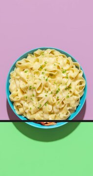 Various pasta dishes isolated on colored backgrounds, vertical video animation.

