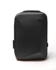 black backpack with asymmetrical design and matte finish, front view