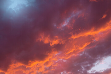 Fototapeta na wymiar Beautiful purple blue sunset sky with cumulus clouds. Natural background. Copy space