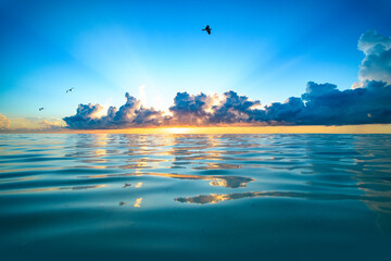 Cloudy sky on sea sunset, sunrise on ocean beach. Sunset landscape in the sky after sunset. Sunrise...