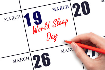 March 19. Hand writing text World Sleep Day on calendar date. Save the date.