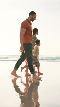Beach, walking and family holding hands, happiness or ocean with weekend break or vacation. Parents, mother or father with summer or seaside with holiday, lens flare or bonding together with children