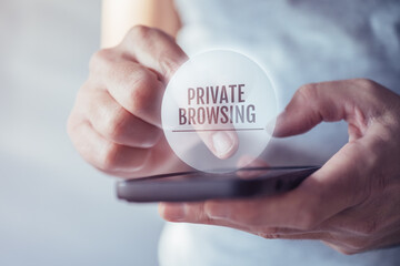 Private browsing concept, man using mobile phone to browse internet without recording history of activity