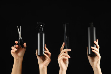 Hairdressing tools and products in female hands.