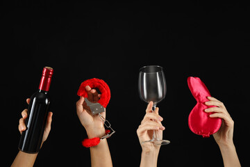 Intimate toys for adults in the hands of women.