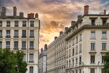 Fototapeta na wymiar Beautiful buildings of Lyon, France against the blue cloudy sky