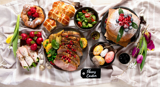 Cheerful Easter table. Traditional food at the event. Holiday concept