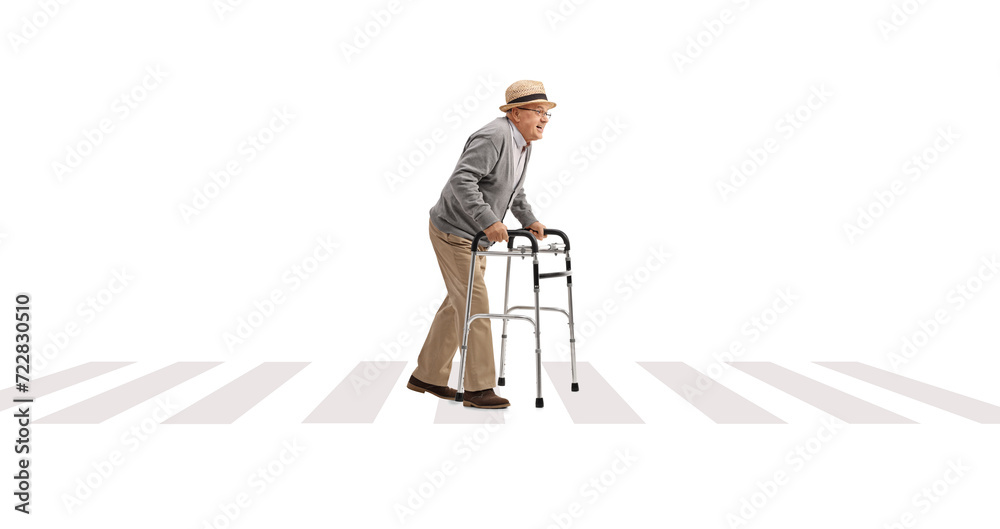 Canvas Prints Full length profile shot of a senior man crossing a street with a walker