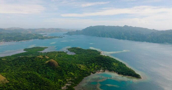 Turquoise sea water around the Island with mangroves. Lajala, Coron. Palawan. Philippines.