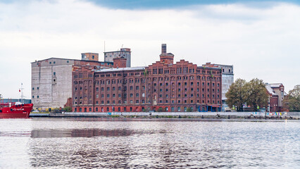 Obraz premium Pregolya river, Kaliningrad, Russia, 2023.09.22. Old grain elevator