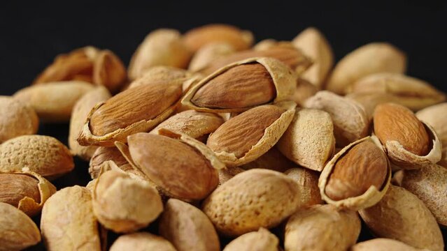 Closeup of almonds，organic badam on table.