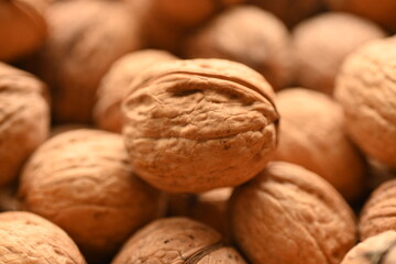 Top view of whole walnuts as background texture