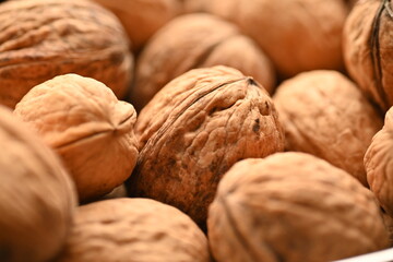 Top view of whole walnuts as background texture