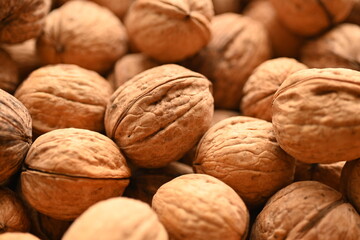 Top view of whole walnuts as background texture