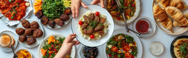 Foto op Plexiglas Breaking Fast, Ramadan iftar dinning table. Top view of muslim family celebrate Eid together share a meal © MiniRiz