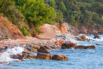 Wild red rocks beach Crvena Glavica, Montenegro