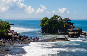 Tanah Lot, Bali, Indonesia - 05 Feb 2015: Tourists gathering at Famous tourist spot, Tanah Lot in Bali Indonesia.