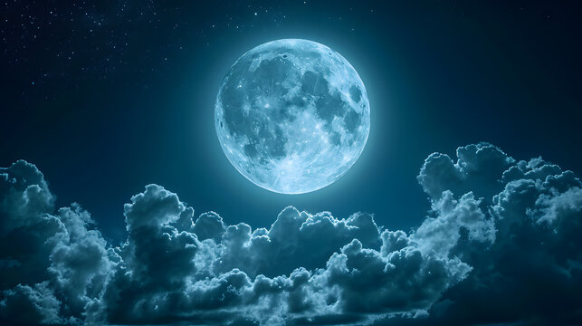 Full moon in the night sky with clouds and stars