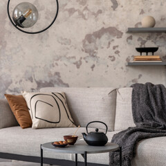 Indiustral style of modern living room with gray sofa with plaid, coffee table, and personal...