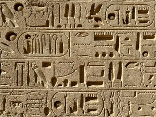 Egyptian wall background, detail of a stone carving