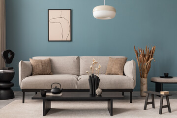 Creative composition of living room interior with mock up poster frame, grey sofa, black coffee table, blue wall, stylish furnitures, decorations and personal accessories. Template. Home decor.  - Powered by Adobe