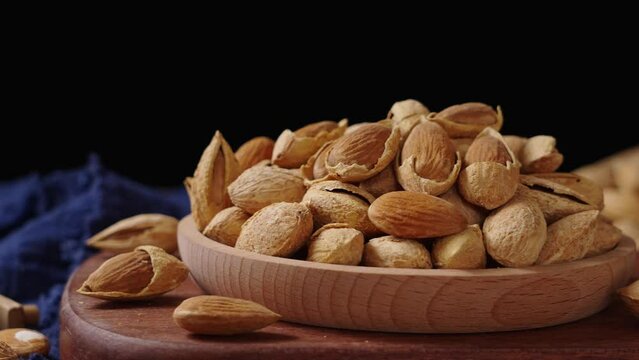 Closeup of almonds，organic badam on table.