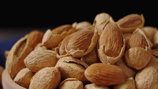 Closeup of almonds，organic badam on table.