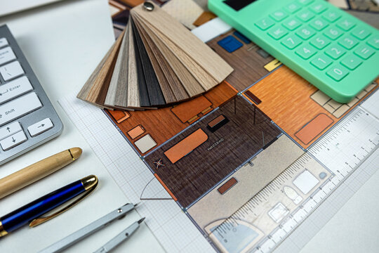 wooden material samples on house project sketch