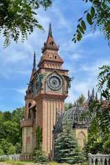 Unique clock tower against the blue sky