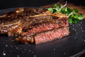 sliced medium rare t-bone steak 