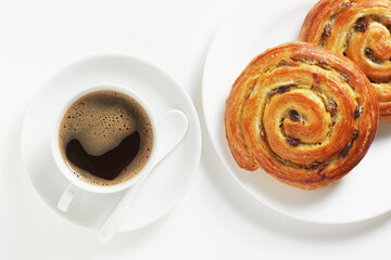 Coffee and puff pastry raisin buns