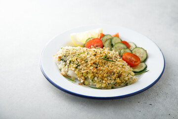 White fish fillet with garlic crumbs and rosemary