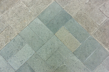 Paving outdoor concrete block floor texture background with green and grey color 