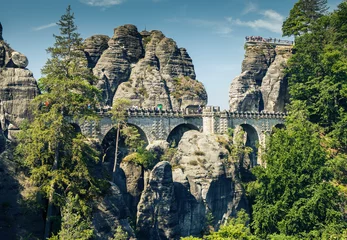 Papier Peint photo Le pont de la Bastei Bastei - a rock formation that is one of the greatest tourist attractions of the Saxon Switzerland National Park, in the Elbe Mountains in the eastern part of Germany