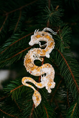 Resin Dragon Epoxy dragon ornament, symbolizing the upcoming 2024 Chinese Year of the Dragon in green pine tree, blending festive tradition with cultural significance.