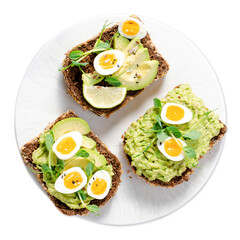 Avocado and Quail Egg Toasts, Healthy Snack or Breakfast on White Background