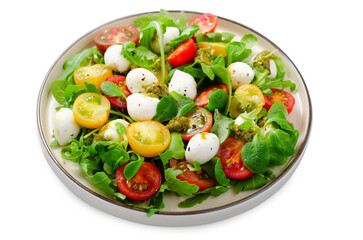 Caprese Salad with Cherry Tomatoes and Pesto Sauce on White Background