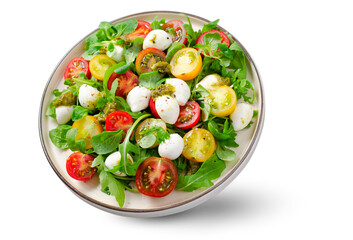 Caprese Salad with Cherry Tomatoes and Pesto Sauce on White Background