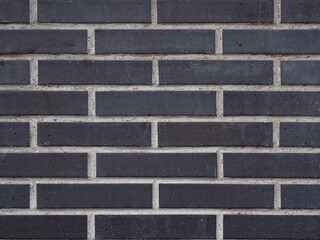 Muro de piedra ladrillo negro con juntas blancas para fondo de pared