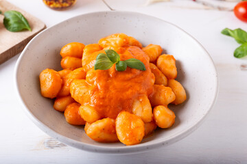 Potato gnocchi with fresh tomatoes sauce. Typical Italian food.