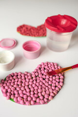 Child doing creativity, gift for Mother's Day or Valentine's Day