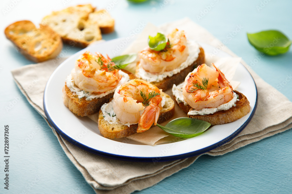 Sticker Shrimp crostini with cream cheese and herbs