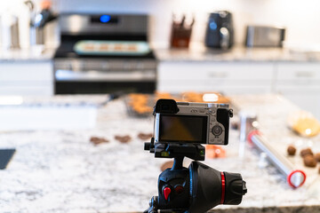 Recording Video with DSLR Camera in Modern Kitchen