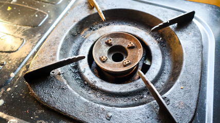 Close-up view of the surface of a frying stove coaster that has been used for a long time, starting...