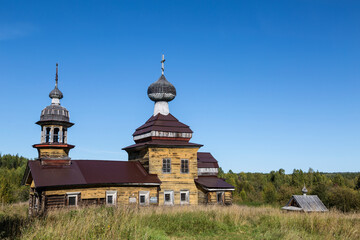 Fototapeta na wymiar The Church of Alexius the Man of God, 1721. It is located in the Kurtyaevo tract near Severodvinsk. Arkhangelsk Region, Russia