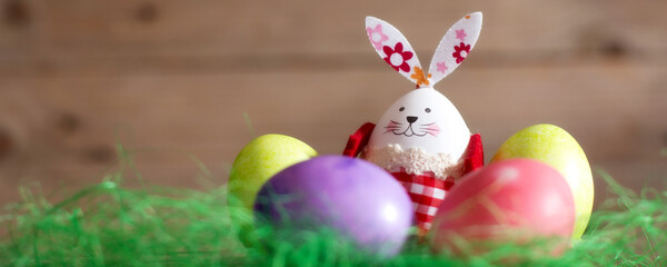 Colorful Easter eggs and bunny rabbit banner