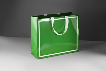 Green paper glossy shopping bag mockup with white handles