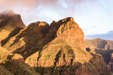 Masca Valley mountains at golden hour with a rainbow. Tenerife, Canary Islands, Spain. - 722911581